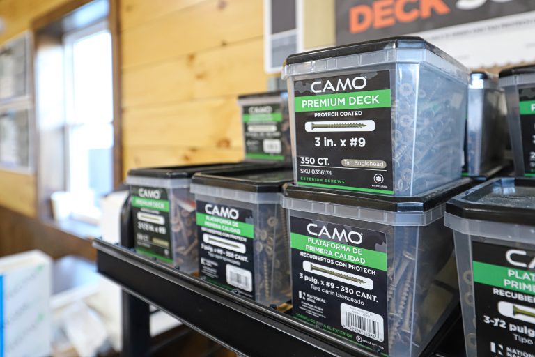 Stacks of bulk Camo premium deck screws, protech coated