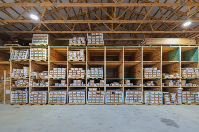 a large variety of vinyl siding in the Cardinal Enterprise warehouse
